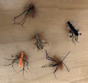Fly patterns imitating daddy long legs or crane flies.