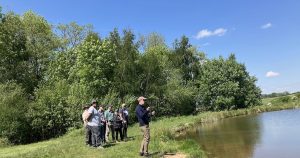 conducting a fly fishing demonstration.