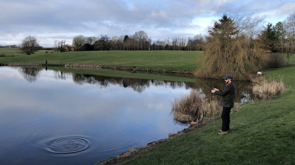 Angler enjoying success during a winter fishing day.